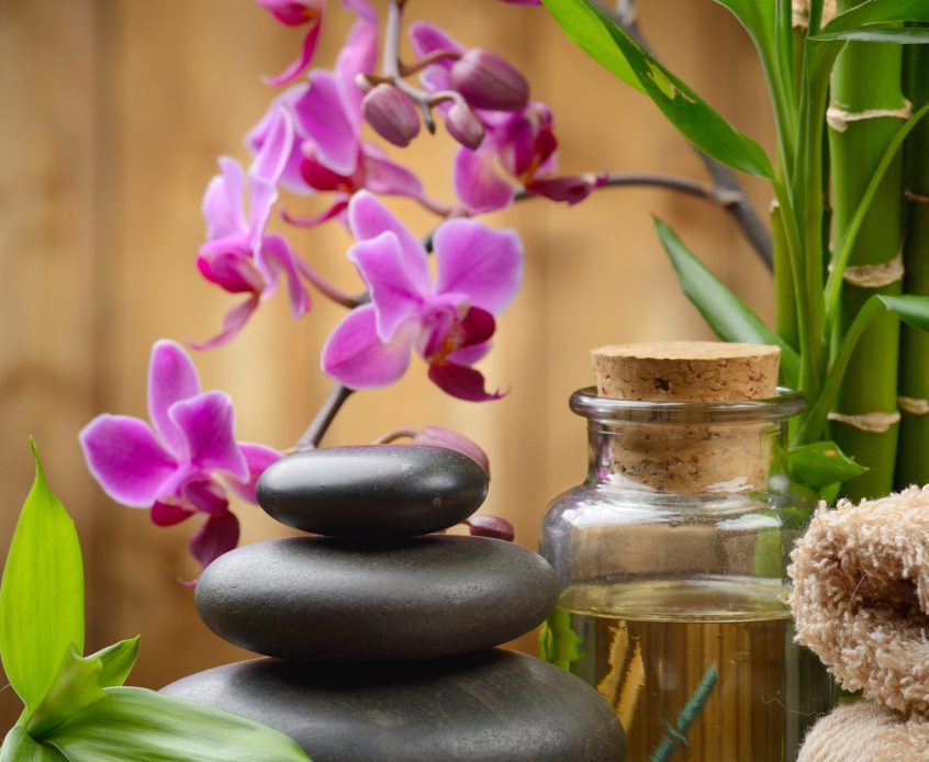 zen basalt stones and bamboo on the wood
